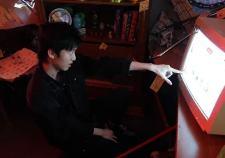 Player using the shared Database to look up the curse